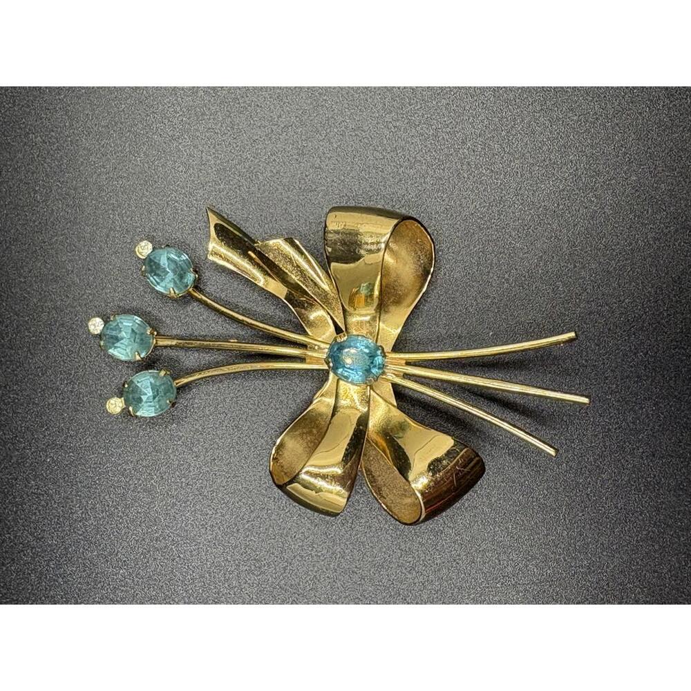 Vintage Gold Tone Coro Blue Rhinestone Bow Brooch
